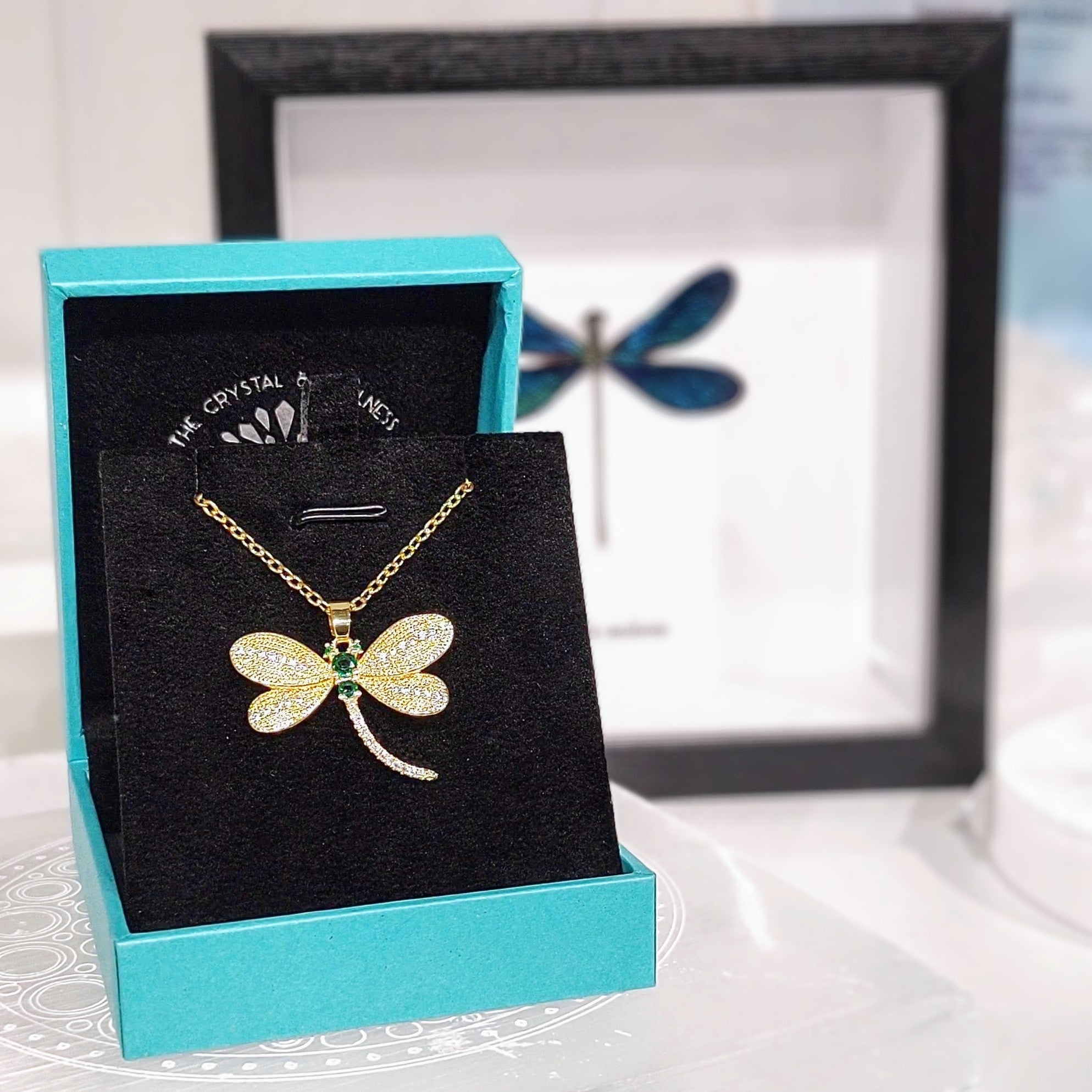 Dragonfly necklace set with cubic zirconia's in gold colour finish with 50cm chain
