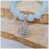 Aquamarine 8mm crystal bead bracelet with silver tree of life charm