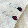 Garnet faceted tear drop shape silver earrings