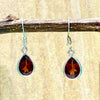 Garnet faceted tear drop shape silver earrings