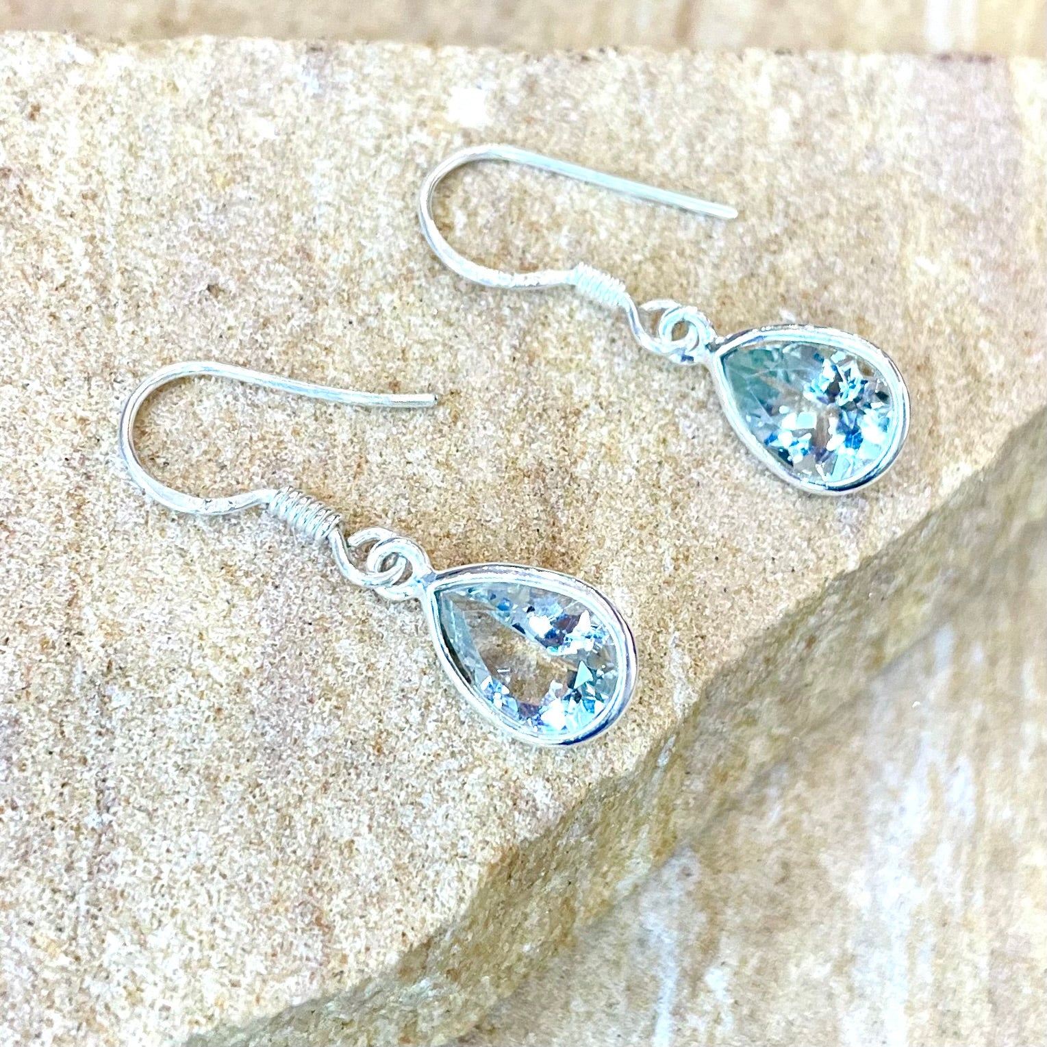 Aquamarine faceted teardrop earrings in sterling silver