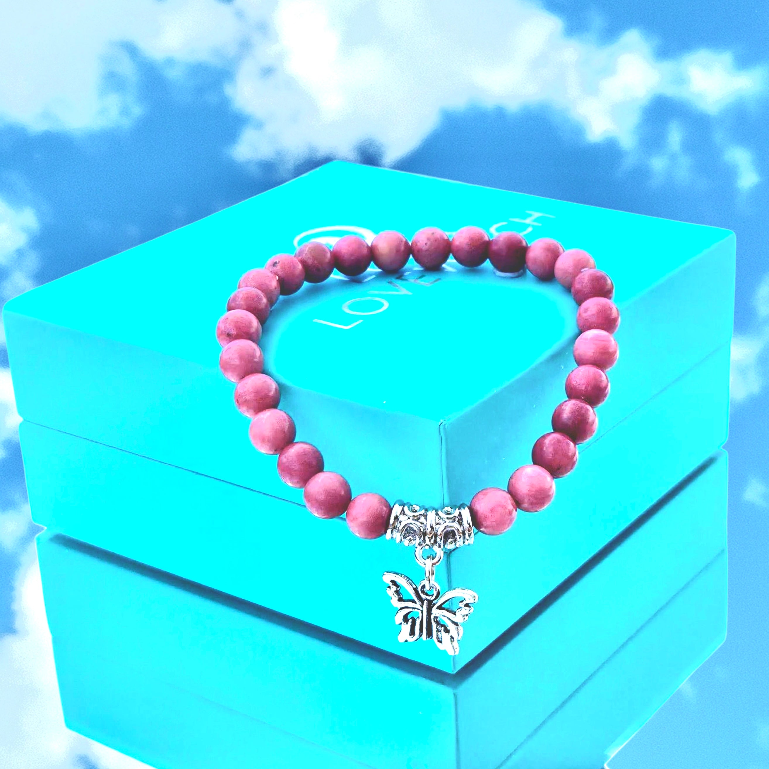 Rhodonite Butterfly polished bead bracelet