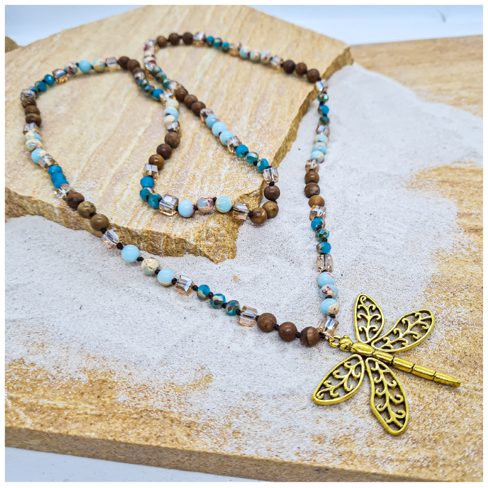 Dragonfly charm necklace with mixed crystal beads of blues and brown tones in luxury gift box