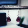 Garnet cabochon teardrop earring in sterling silver