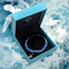 Matte blue mermaid glass bead bracelet with turtle charm in luxury gift box