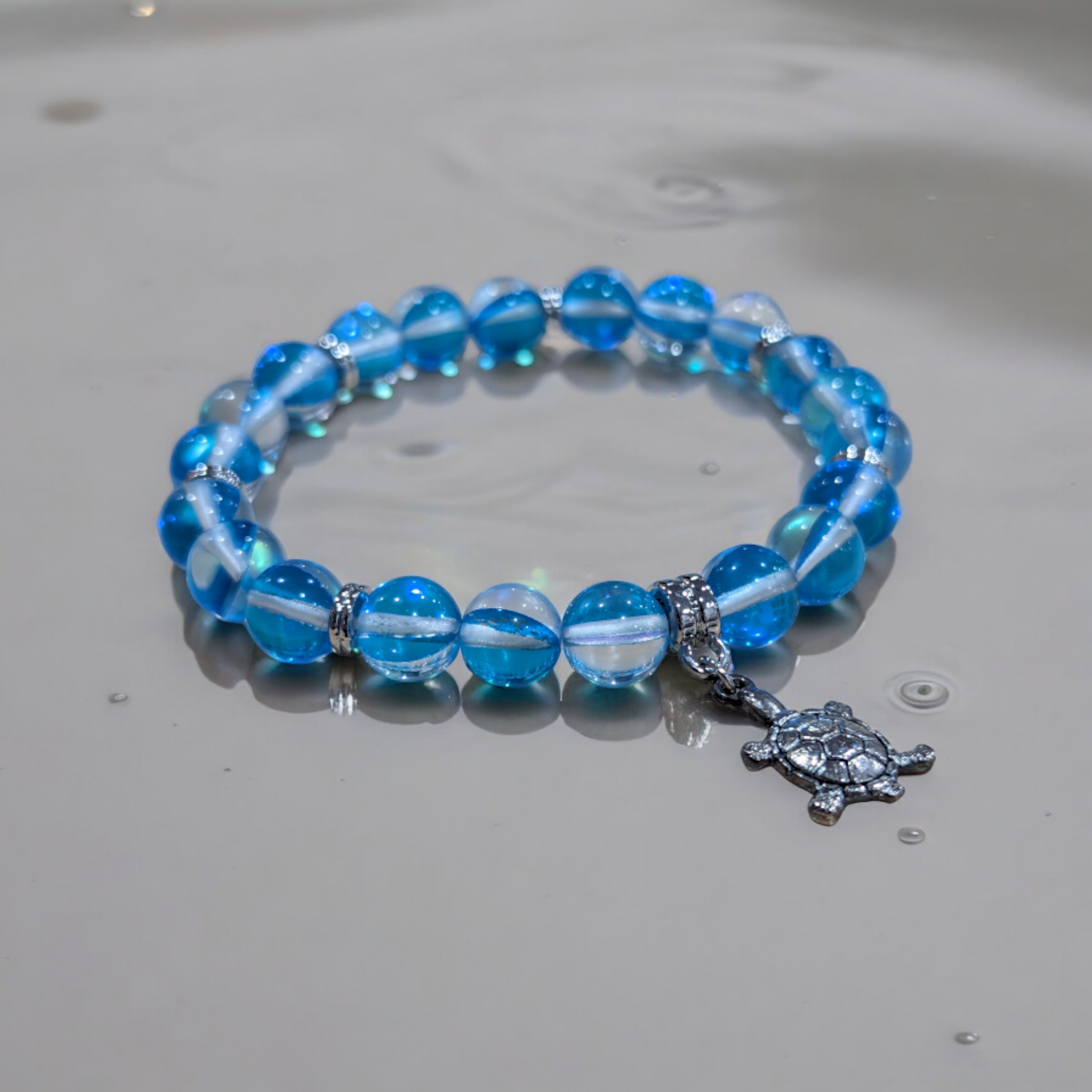 Aqua blue mermaid glass bead bracelet with turtle charm