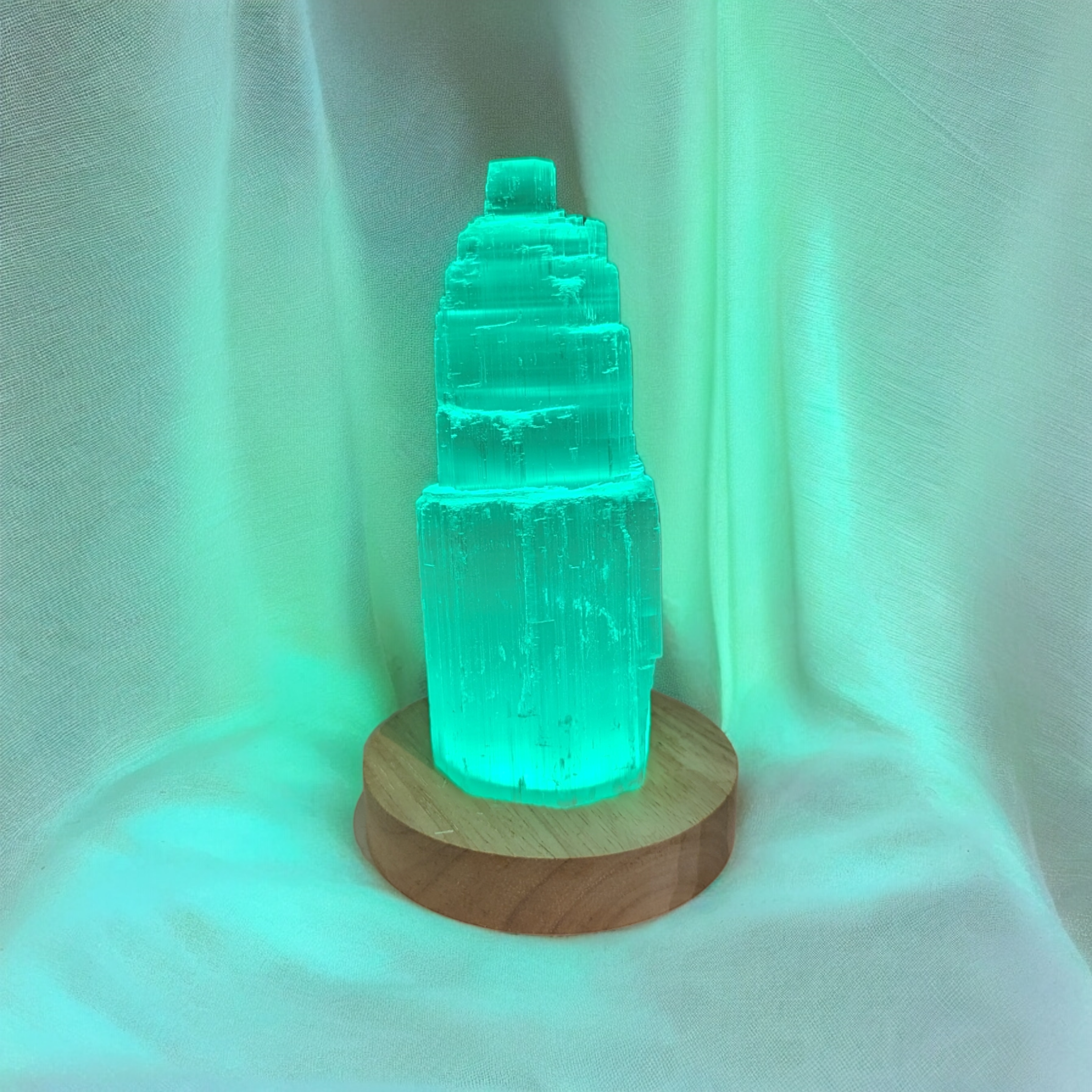 Colour changing LED light wooden stand for crystals