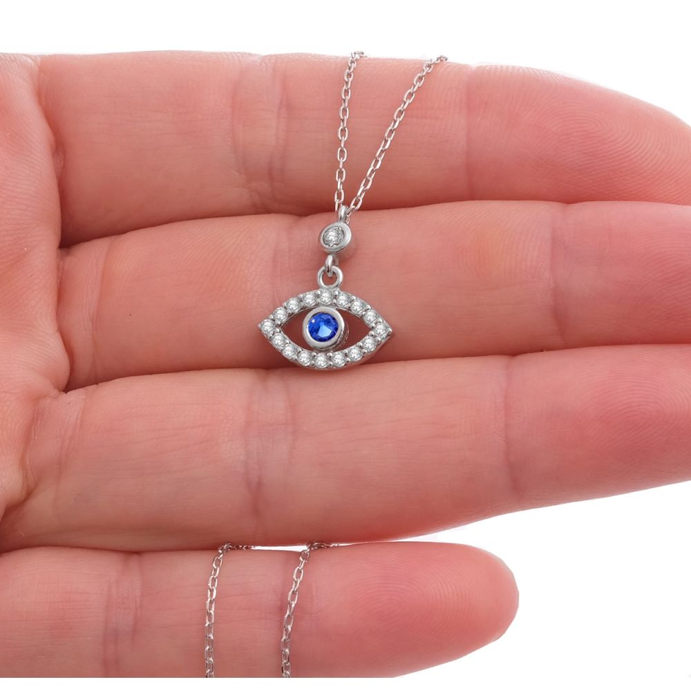 Evil eye celebrity style oval eye necklace in sterling silver set with cubic zirconia drop design