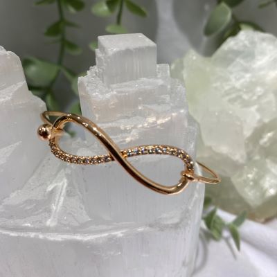 Rose gold style finish infinity bangle Bracelets The Crystal and Wellness Warehouse 